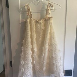 Pink Lily “We Make the Rules Pom Dress Off White” in size Small.